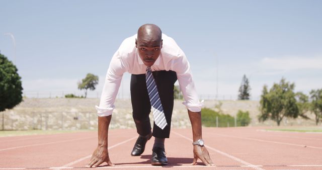 Businessman Ready for Race on Track in Field - Download Free Stock Images Pikwizard.com