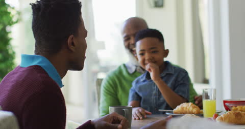 Multi-Generational African American Family Sharing a Meal
