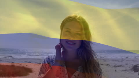 Dutch Flag Overlay on Mother and Child Playing at Beach