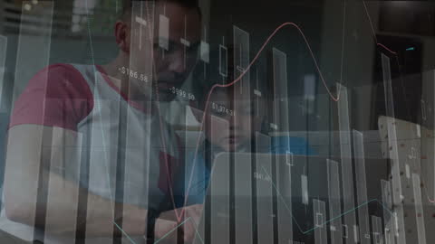 Father and Son Analyzing Data with Interactive Digital Charts