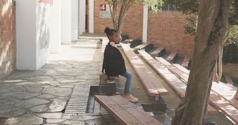 Child Waiting for Class Outside School Building - Download Free Stock Images Pikwizard.com