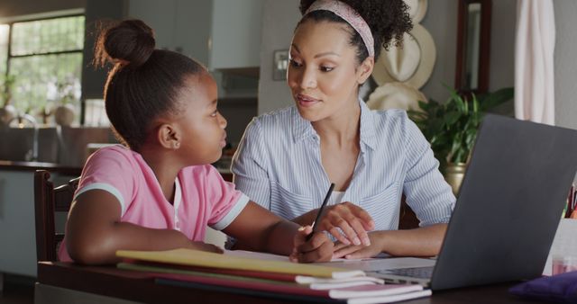 Diverse Mother and Daughter Engaged in Online Learning at Cozy Home - Download Free Stock Images Pikwizard.com