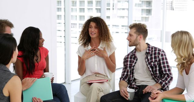 Therapist Leading Group Counseling Session in Bright Office - Download Free Stock Images Pikwizard.com