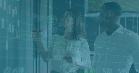 Corporate Team Analyzing Interactive Data Interface