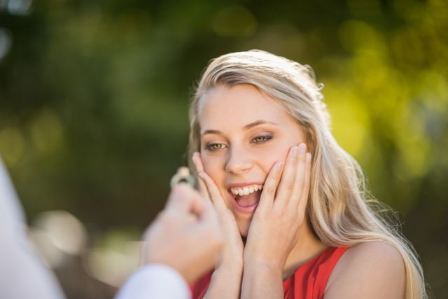 Beautiful woman surprised after seeing the ring