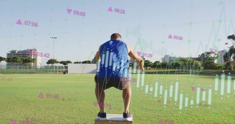 Athlete performing plyometric box jump on field with digital performance data overlays