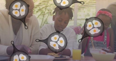 Family bonding cooking activity with falling egg pans overlay