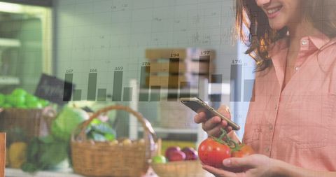 Woman Analyzing Financial Data While Shopping at Grocery Store