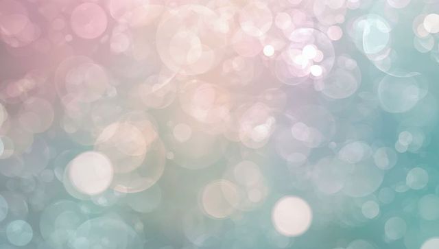 Pastel Bokeh Light Background with Dreamy Teal and Pink Orbs for Web and Print