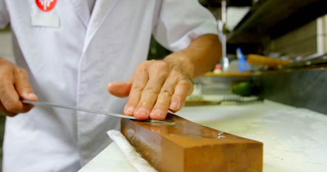 Close-Up of Professional Chef Sharpening Knife on Whetstone - Download Free Stock Images Pikwizard.com