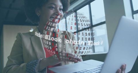 Businesswoman Interacting with Blockchain Hologram in Office
