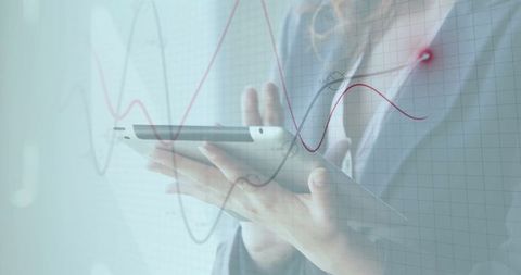 Business Professional Analyzing Data on Tablet with Graphs - Download Free Stock Images Pikwizard.com