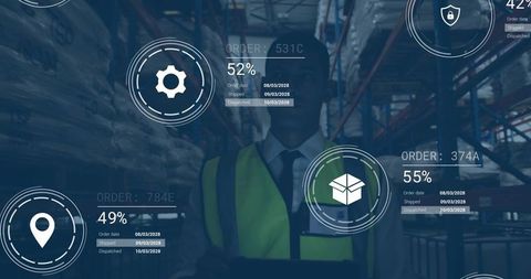 Warehouse worker holding tablet monitoring ar inventory dashboard over racking and pallets