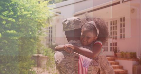 Military Reunion with Happy Child Holding American Flag