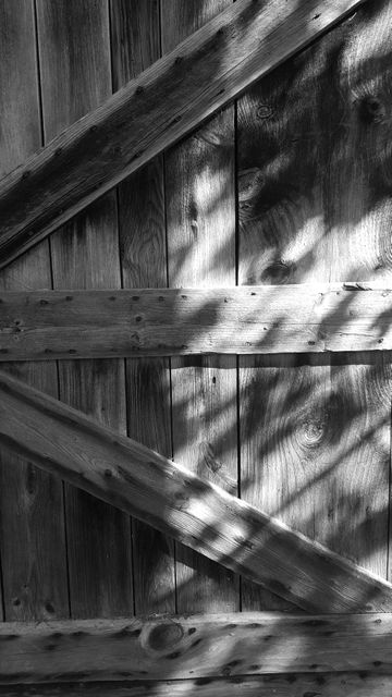 Weathered Wooden Fence with Sunlight and Shadows - Download Free Stock Images Pikwizard.com