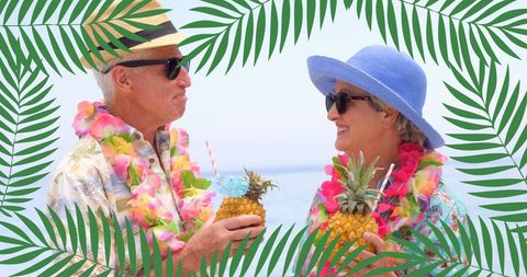 Caucasian Senior Couple Enjoying Tropical Beach Drink