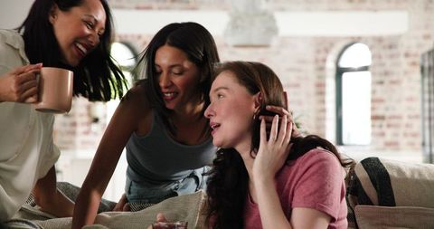 Joyful Reunion with Friends Celebrating Engagement at Home