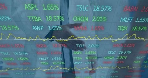 Reviewing stock tickers on transparent display, business team planning market strategy