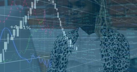 Businesswoman Analyzing Digital Financial Data Overlays in Modern Office