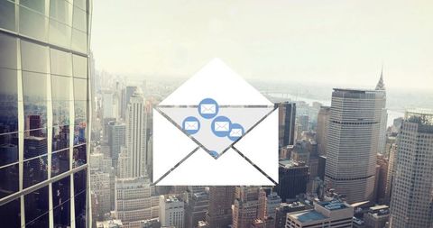 Envelope graphic releasing message icons over urban skyline for digital communication