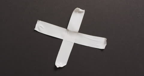 White Paper Cross on Dark Background for Projects