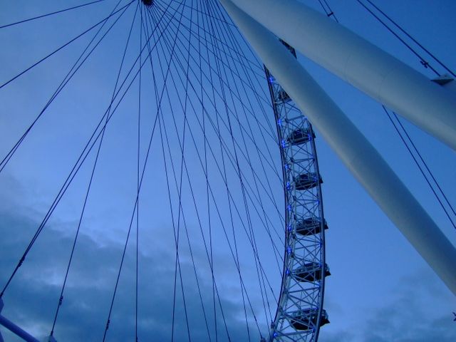 Close-up of Ferris Wheel Against Evening Sky - Download Free Stock Photos Pikwizard.com
