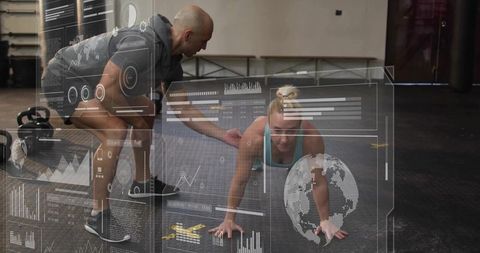 Fitness Trainer Guiding Client in Plank with Data Overlay in CrossFit Gym