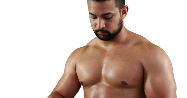 A muscular man's upper body is displayed, emphasizing his fitness and contemplative mood. - Download Free Stock Photos Pikwizard.com
