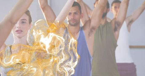 Diverse group stretching class raising arms with flowing gold overlay for wellness