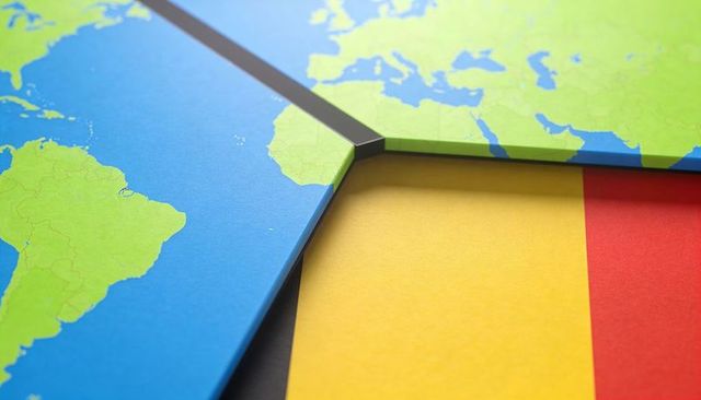 World map puzzle pieces meeting over belgian flag seam representing geopolitics and unity