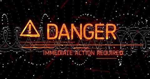 Flashing danger warning screen with cyber alert symbols