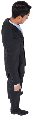 Transparent Focused Businessman in Black Suit Looking Down
