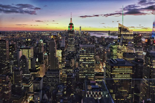 Vibrant New York City Skyline at Dusk with Glowing Lights - Download Free Stock Photos Pikwizard.com