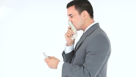 Businessman Counting Money with Surprised Expression