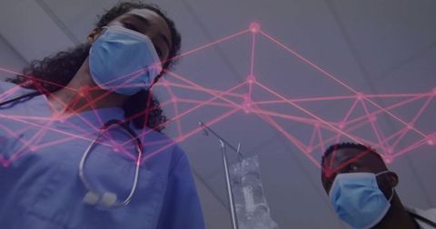 Doctors Analyzing Technology in Hospital with Network Diagram