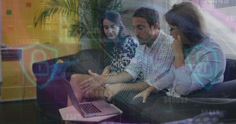 Diverse Team Collaborating on Cybersecurity Solutions in Modern Office