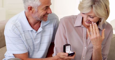 Mature Couple Engaging in Marriage Proposal at Home - Download Free Stock Images Pikwizard.com