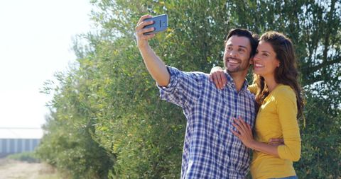 Happy Young Couple Taking Selfie Outdoors in Sunny Day - Download Free Stock Images Pikwizard.com
