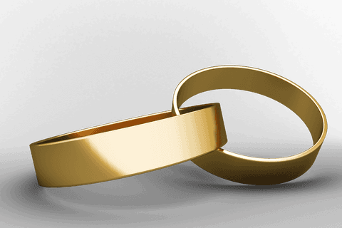 close-up transparent image of elegant golden wedding rings - Download Free Stock Videos Pikwizard.com