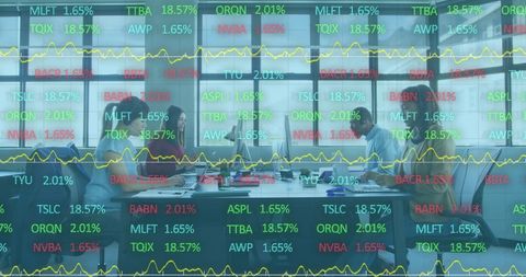 Business team analyzing financial data projections in contemporary office