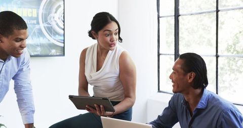 Diverse business team meeting in modern office space