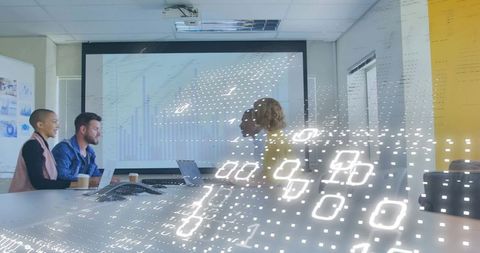 Business team analyzing financial data with digital data overlay in modern conference room