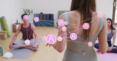 Yoga instructor leading mindful group class with digital community network overlay