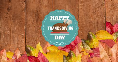 Thanksgiving Day Greeting on Wood Background with Autumn Leaves - Download Free Stock Images Pikwizard.com