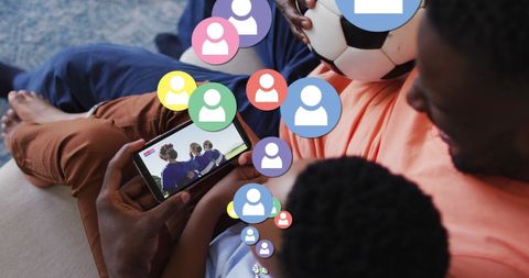 Father and Son Bonding Over Football and Social Media