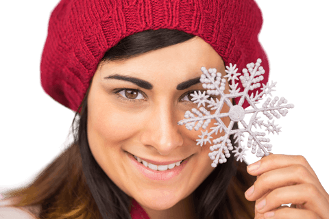 smiling woman holding snowflake with red knit hat, holiday spirit - Download Free Stock Videos Pikwizard.com