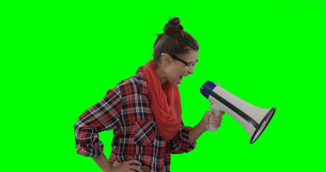 Enthusiastic Woman Shouting into Megaphone with Green Screen Background - Download Free Stock Images Pikwizard.com