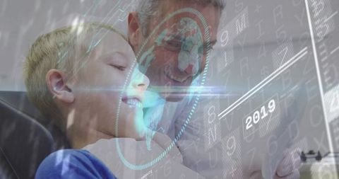 Boy and Man Interacting with Digital Holographic Tablet in Living Room