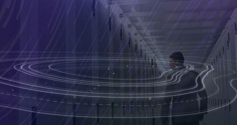 Engineer Walking in Data Center with Futuristic Overlay