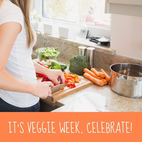 Woman Preparing Fresh Vegetables in Modern Kitchen for Veggie Week - Download Free Stock Templates Pikwizard.com